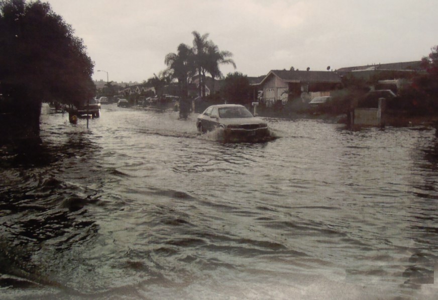 car on flooded street