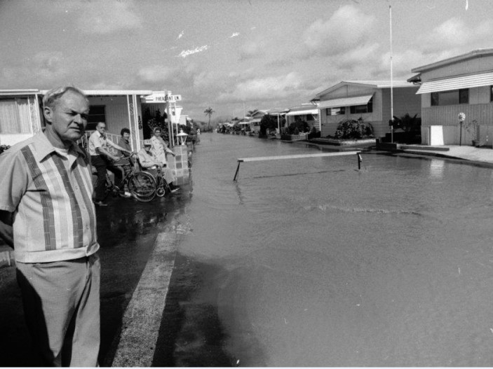 man and flooded street